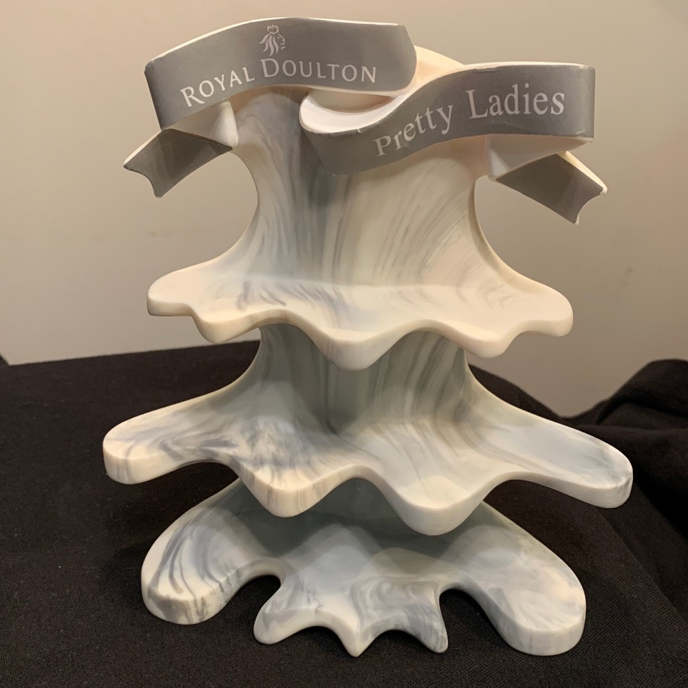 Royal Doulton shelf for small Pretty Ladies.